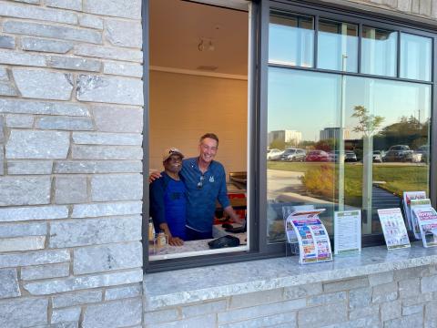 Rao and Kurt Wagner volunteering to raise funding for free amenities at the Oak Brook Park District